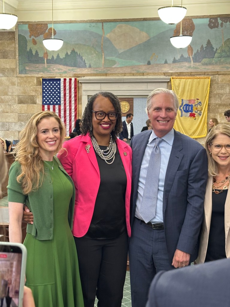 Sen. Angela Mcknight, a Democrat from Jersey City, poses for a photo with Bill and Elizabeth Reid from the Jack Reid Foundation. In 2022, their son Jack took his life after bullying while attending a private boarding school. Since then, his parents created the Jack Reid foundation and have dedicated themselves to legislative protections against bullying for private school students.